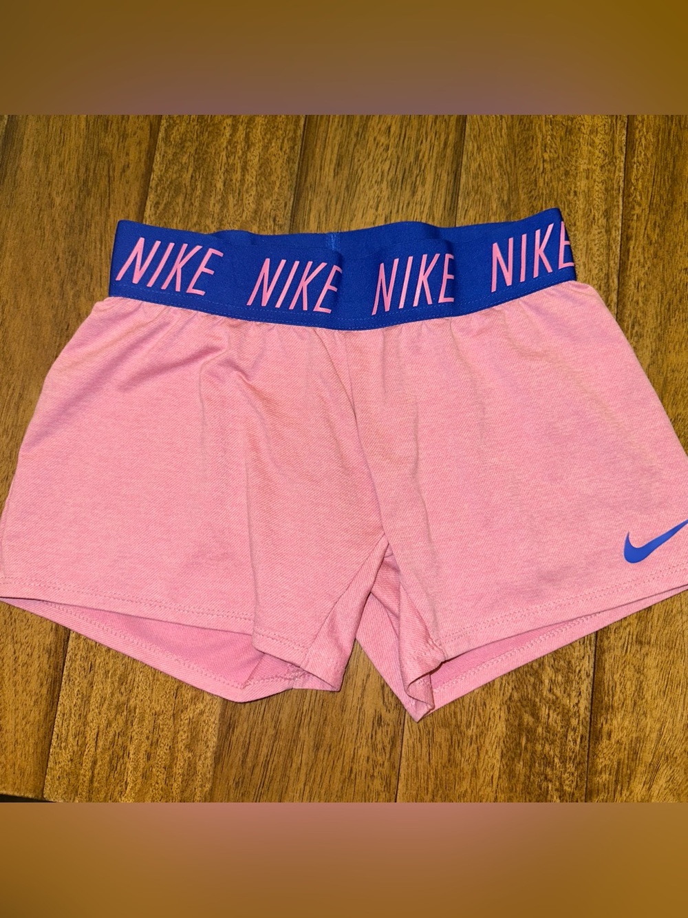Nike Pink Athletic Shorts with Blue Branded Waistband